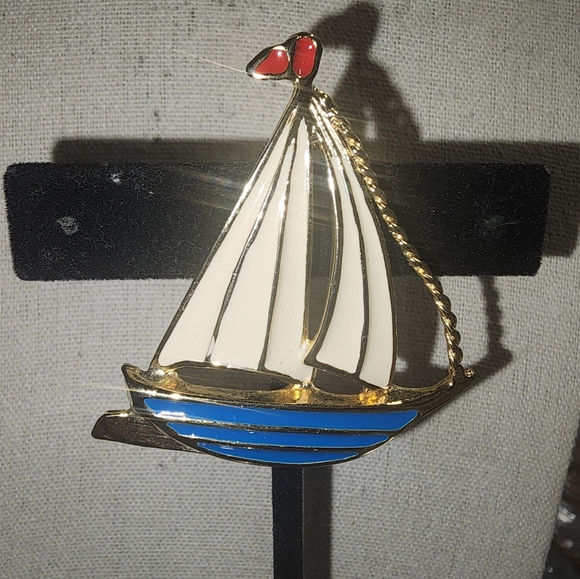 Jewelry - Vintage Goldtone Sailboat Brooch with White Blue and Red Enamel Accents
